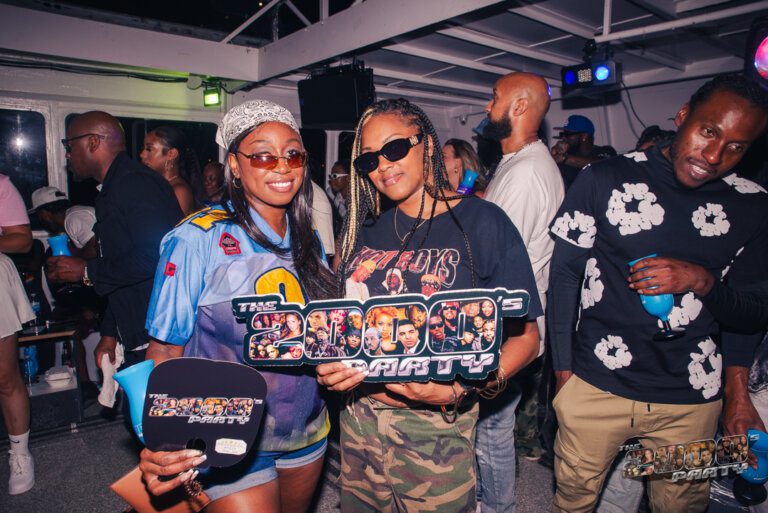 2 Ladies dressed in 2000's fashion for the 2000's Party Boat Cruise