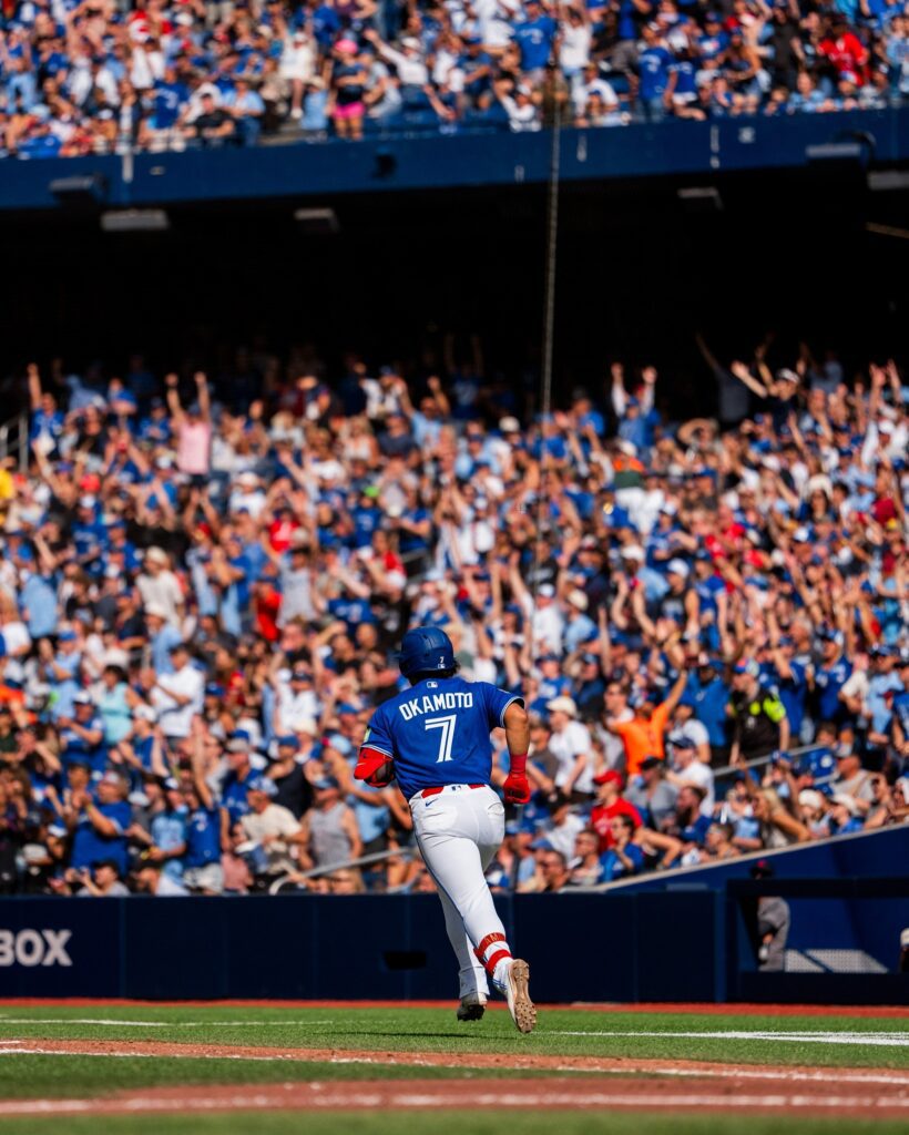 Kazuma Okamoto rookie RBI record Toronto photo 2